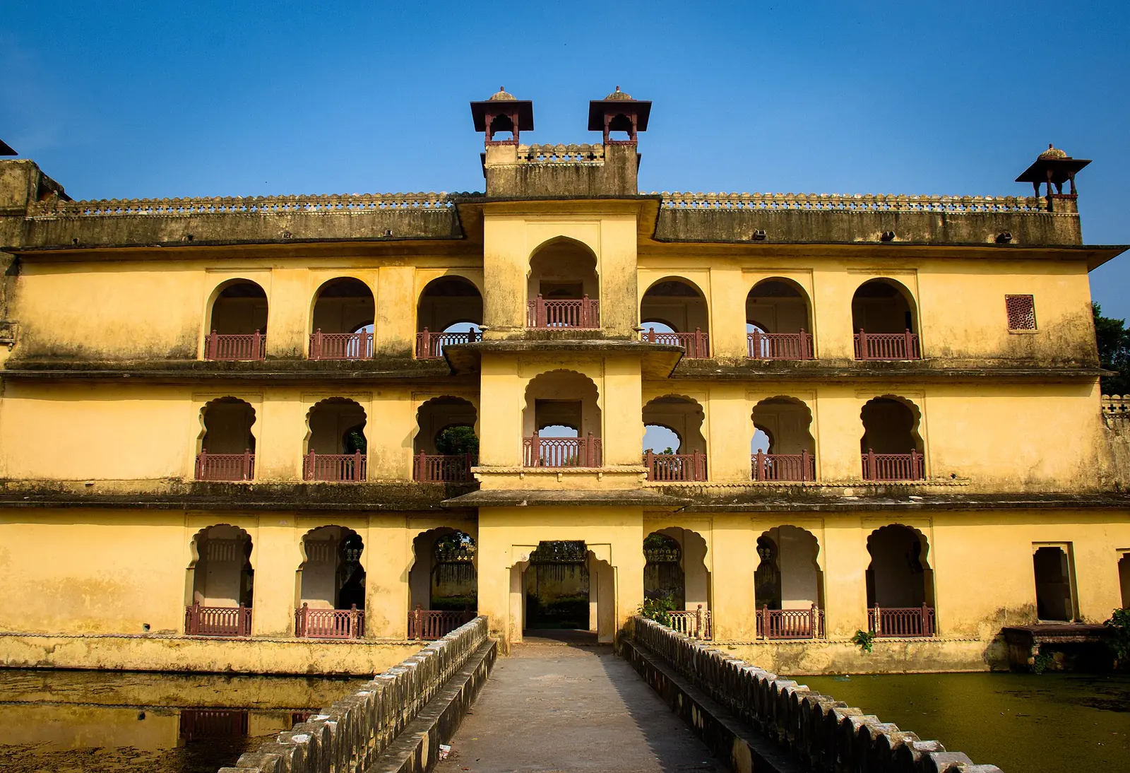 Abheda Mahal palace beside its lake, next to the park